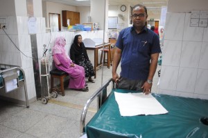 Dr. Mohammad Abdul  Quaiyum designed a simple cotton and tissue paper birth mat to identify post-partum haemorrhage. Photo: Amy Yee